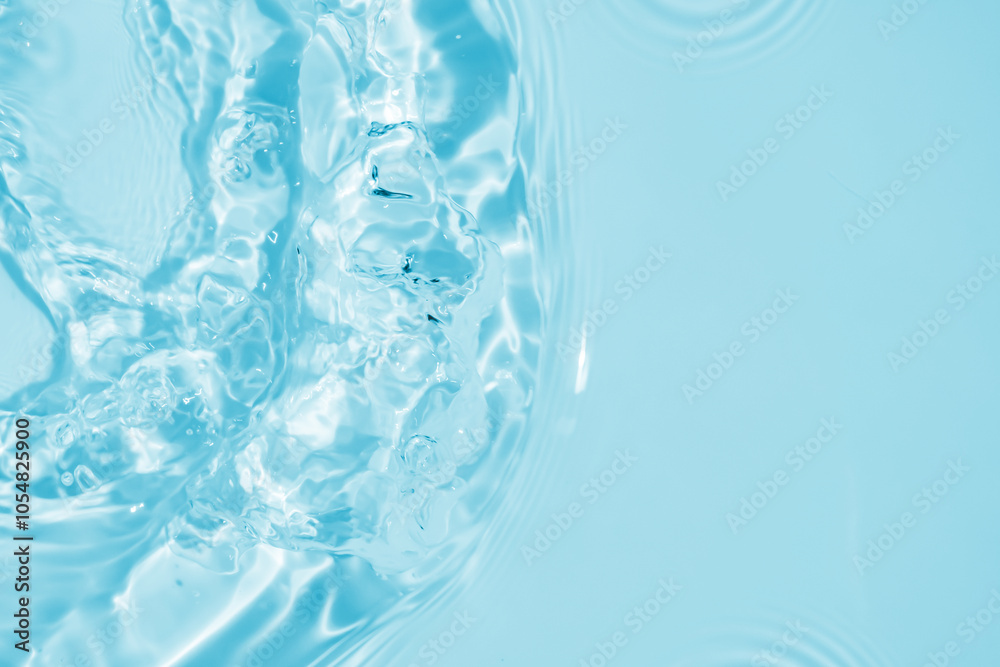 Abstract transparent water shadow surface texture natural ripple on blue background Abstract transparent water shadow surface texture natural ripple on blue background