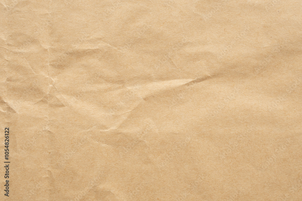 Fototapeta premium Abstract crumpled and creased recycle brown paper texture background