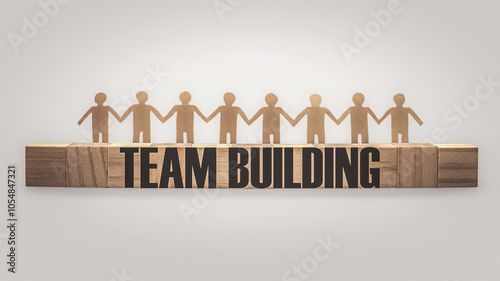 Team building together. Unity of group worker. Business cooperation. Paper dolls and wooden cube blocks. Teamwork collaboration. photo