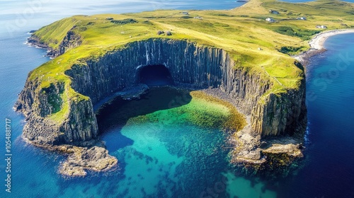 Aerial view of Staffa Island, with Fingal's Cave prominently featured, surrounded by the stunning coastline and crystal-clear waters. No people included. photo