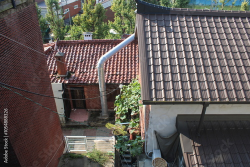 Top view of traditional Korean hanok style roof top and courtyard garden