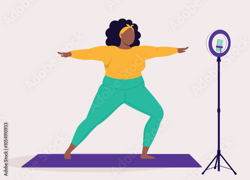 One Overweight Black Woman In Activewear Live Streaming Workout Using Handphone And Ring Light.