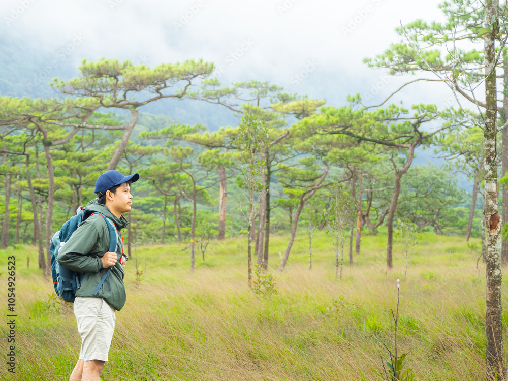 Portrait of Asian traveler man with backpack on hiking trip in forest. Portrait of Asian traveler man with backpack on hiking trip in forest.