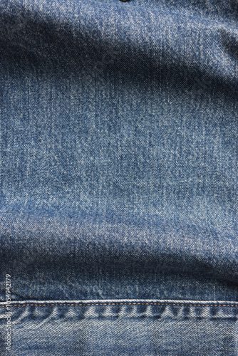 seam of blue denim texture background, jean fashion style