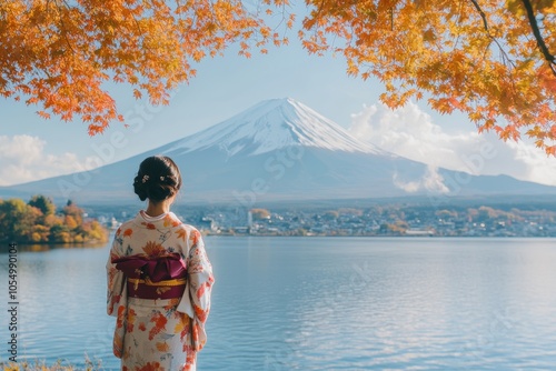 Autumn beauty at lake kawaguchiko  vibrant leaves, mount fuji, and a kimono clad woman photo