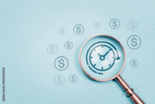 Time is money and time management concept, work planning increases efficiency and reduced work time. Magnifying glass focus to clock and money icon for business time management.