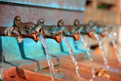 Photos Ornate Water Spouts with Flowing Water