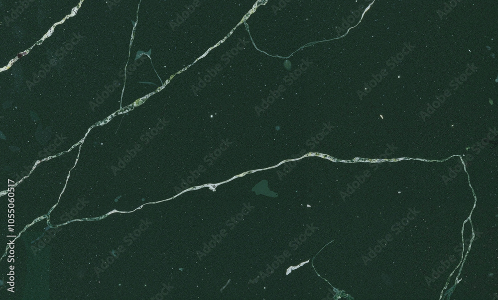 Deep forest green marble with delicate white veins Deep forest green marble with delicate white veins