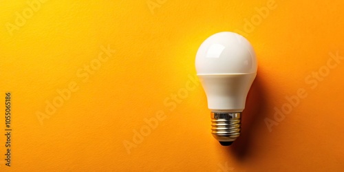 White light bulb on yellow background with copy space reflected