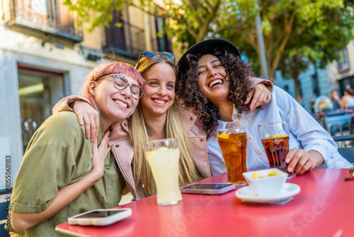 Happy friends meeting on a bar terrace