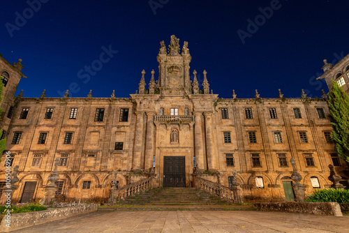 Baroque portal of the San Martino Pinario monastery at theImmaculata square in Santiago de Compostela at night, Galicia