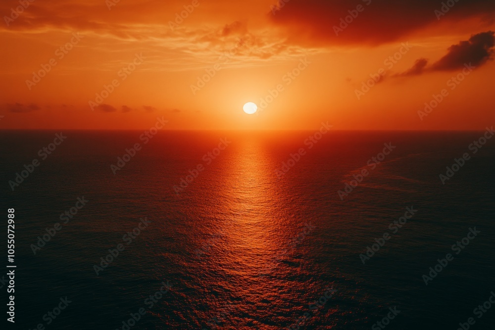 Obraz premium Fiery Sunset Over the Ocean