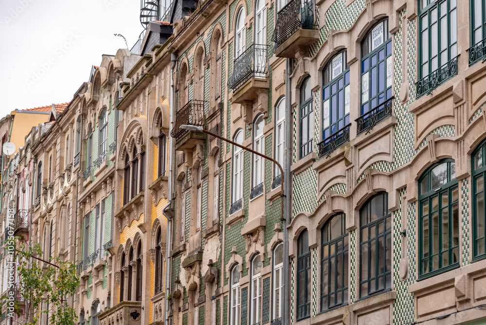 Fototapeta premium Typical residential city houses with decorative colorful tiles at the facade at the street Alexandre Braga in Porto