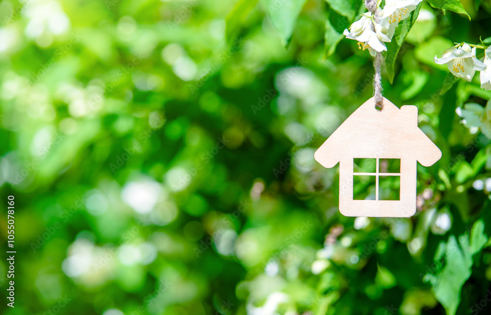 Symbol of the house on the branches of a flowering jasmine
Symbol of the house on the branches of a flowering jasmine