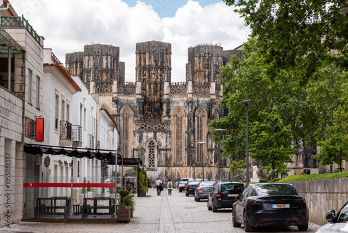 Picturesque medieval Santa Maria da Vitoria monastery in Batalha, a manueline gothic masterpiece, view on the facade of the unfinished chapel photo