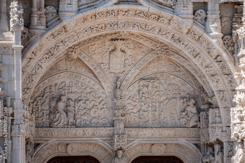 Portal of the Jeronimos monastery church of St. Maria of Belem in Lisbon, Portugal, a manueline architectural masterpiece photo