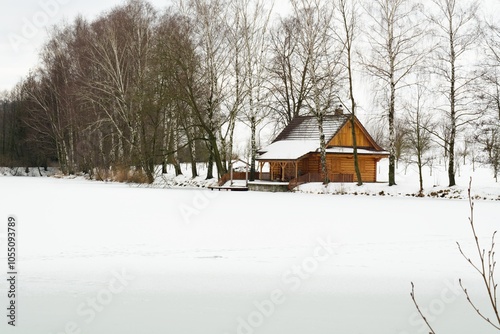Obraz na płótnie Frozen pond with a cottage near the village of Babice. Czechia. w salonie