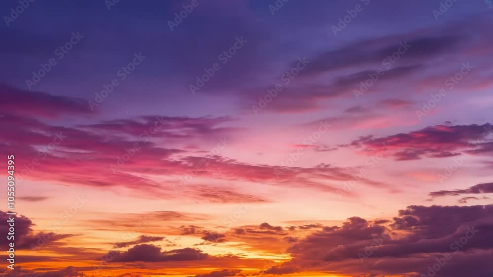 Time-lapse of clouds running over sky at sunset Time-lapse of clouds running over sky at sunset