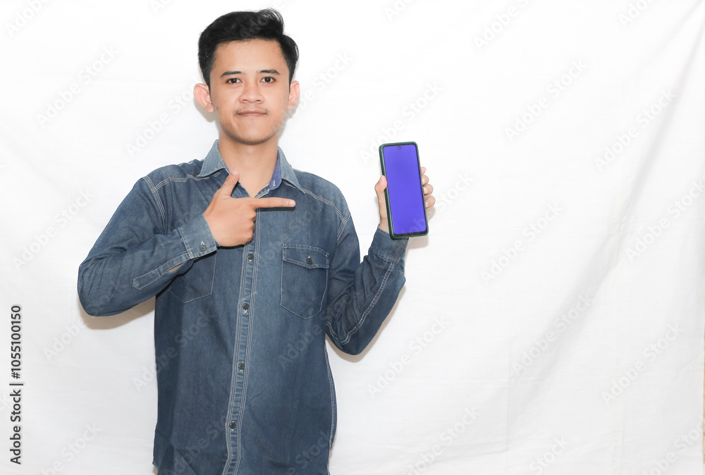 Asian man showing blank screen cellphone with happy expression isolated on white background Asian man showing blank screen cellphone with happy expression isolated on white background
