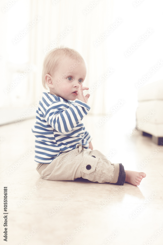 Play, baby and crawling for development with growth or motor skills as healthy boy in living room. Young, male person and infant as curious for learning, mobility and progress in family home as child Play, baby and crawling for development with growth or motor skills as healthy boy in living room. Young, male person and infant as curious for learning, mobility and progress in family home as child
