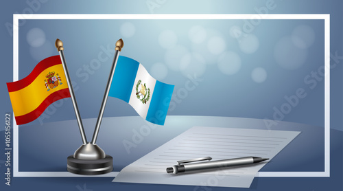 Spain and Guatemala Small national flag on bokeh background, cooperative relationship