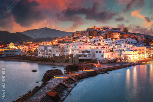 Obraz na płótnie A stunning view of Naxos Island, Greece, featuring crystal-clear turquoise waters, rugged coastlines, and charming white-washed buildings. A picturesque paradise for travelers and sun-seekers. w salonie