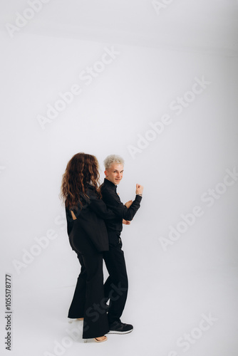 Couple dancing social dance. Kizomba bachata or semba salsa or taraxia on white background with copy space banner and place for text - Social dance concept. photo