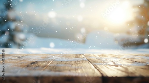 Wooden table with snow in winter forest background. Empty rustic wood plank tabletop on foreground of abstract frosty snowy trees. Winter landscape. Christmas card photo