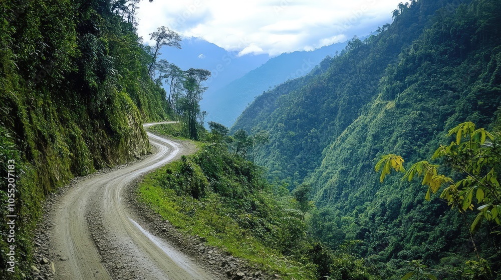 A narrow, serpentine mountain road cutting through dense forests, with dramatic turns and rugged terrain surrounding the path A narrow, serpentine mountain road cutting through dense forests, with dramatic turns and rugged terrain surrounding the path