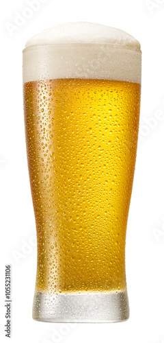 Glass of beer with foam on top and condensation on the glass