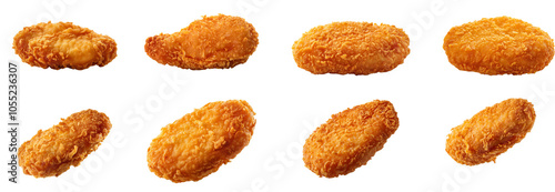 Crispy chicken nuggets arranged neatly, isolated on a white background.