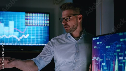 Stock market analyst presentation in front of computer screen