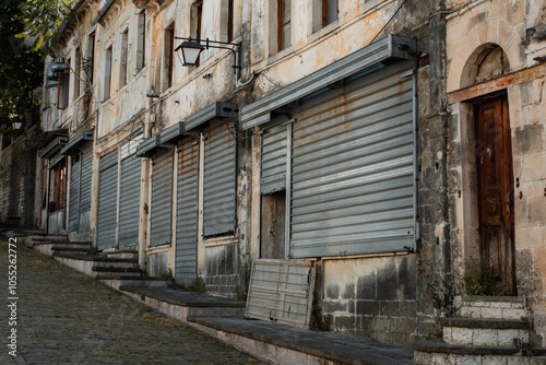 Closed storefronts on the streets of Gjirokaster in Albania