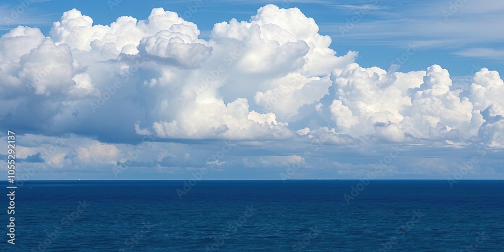 Scenic view of fluffy clouds over the tranquil sea, calming, peaceful, ethereal Scenic view of fluffy clouds over the tranquil sea, calming, peaceful, ethereal