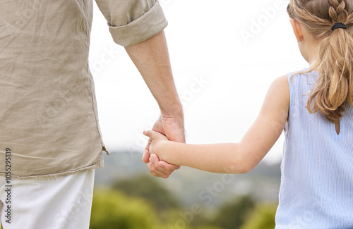 Garden, father and girl with holding hands for care, trust and bonding as family. People, back view and parent with kid together for love, relax and rest on break at park with support for childcare