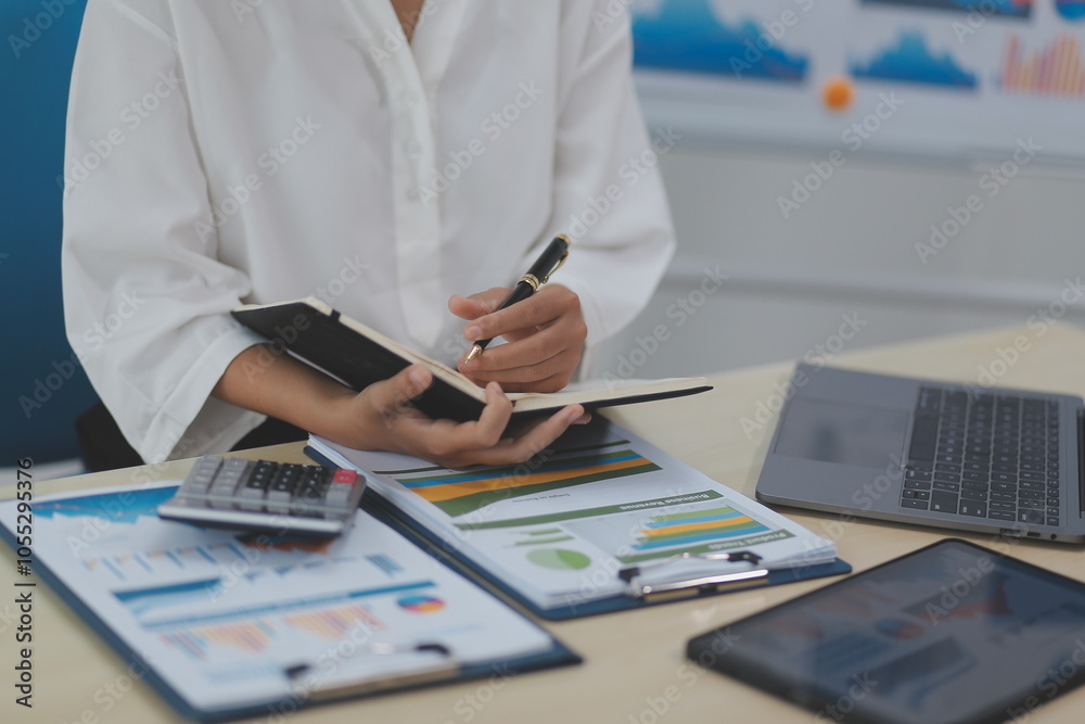 Fototapeta premium Business Documents, Auditor businesswoman checking searching document legal prepare paperwork or report for analysis TAX time,accountant Documents data contract partner deal in workplace office