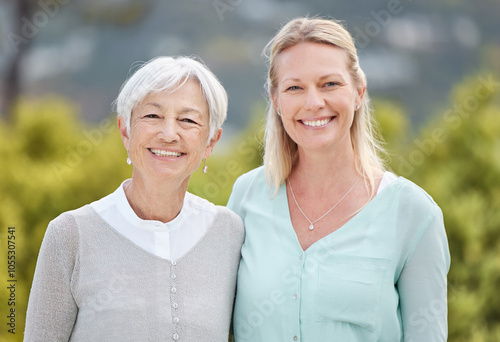 Happy, portrait and women with senior mother, daughter and hug in nature, park and summer for holiday. Smile, love and mom embracing lady with care for vacation, adventure or weekend break for family