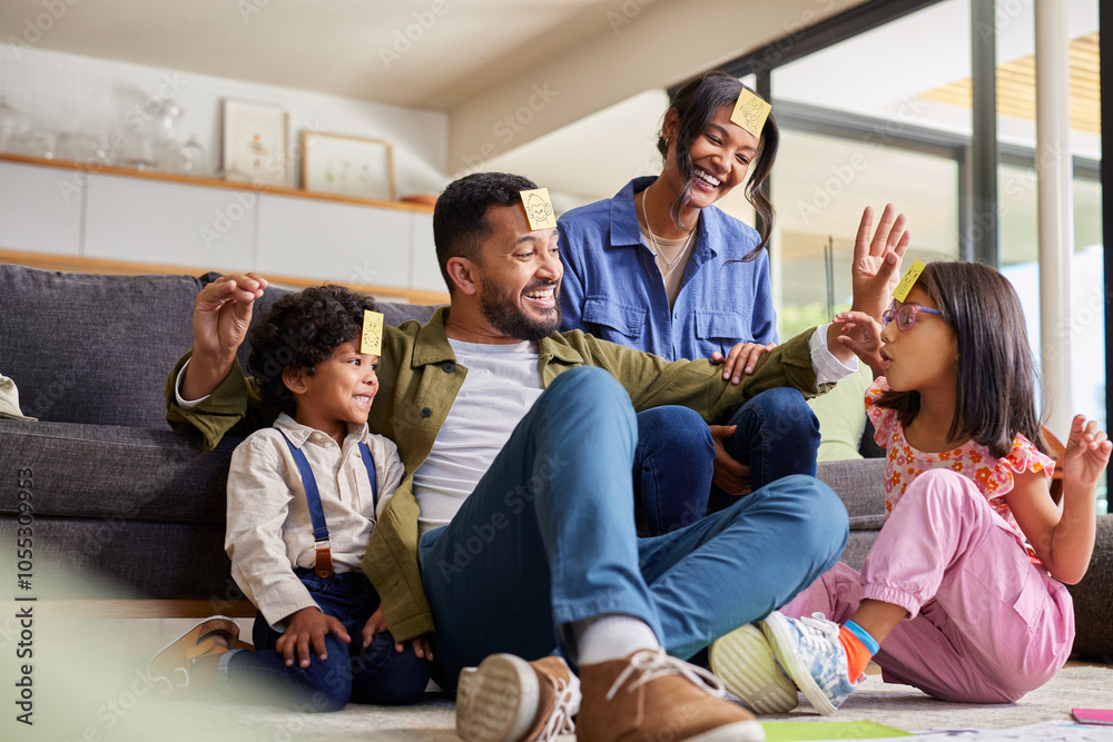 © Rido - Mixed race family playing together at home