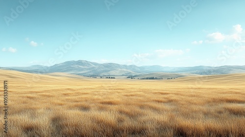 A Golden Field of Grass Bordered by Rolling Hills and a Blue Sky