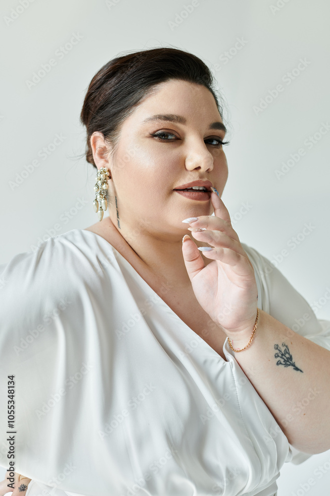 A beautiful plus size bride in a flowing white dress and sparkling earrings radiates elegance. A beautiful plus size bride in a flowing white dress and sparkling earrings radiates elegance.