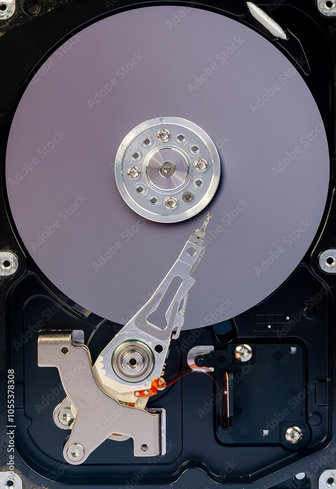 Hard drive close up, without cover, top view, detail, digital storage and security Hard drive close up, without cover, top view, detail, digital storage and security