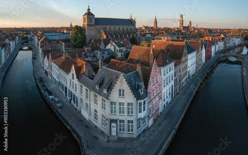 Aerial view of picturesque canal with charming buildings and spires, Bruges, Belgium. photo