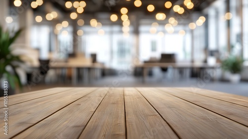 Empty wooden tabletop with blurred bokeh office interior background, perfect for product display or montage