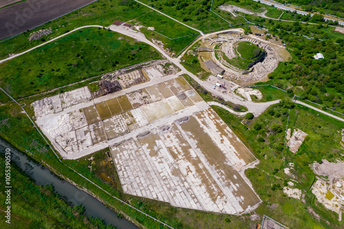 Aerial view of prehistoric salt production site with ancient ruins and green fields, Provadia, Bulgaria. photo