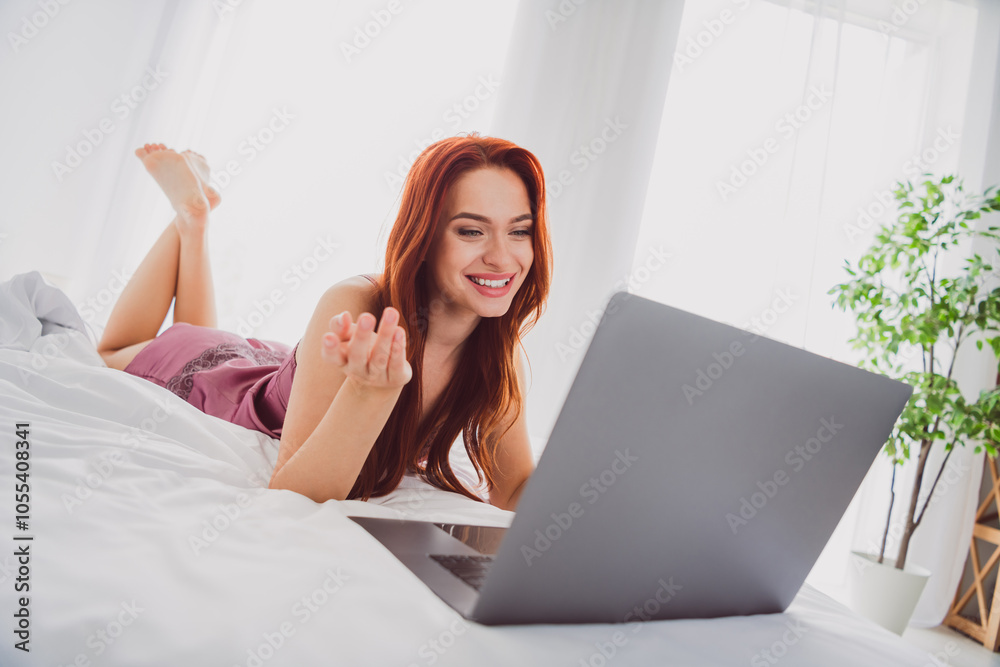 Photo of positive nice girl wear sleepwear comfy bed using netbook device bedroom indoors white light interior Photo of positive nice girl wear sleepwear comfy bed using netbook device bedroom indoors white light interior