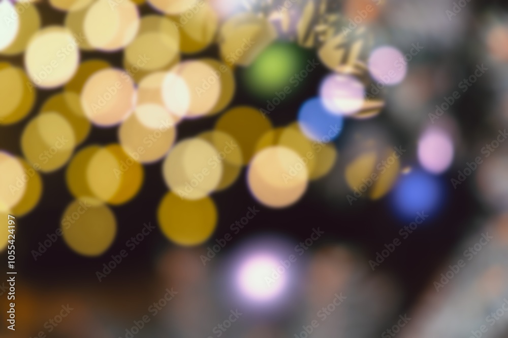 Blurred Christmas and New Year theme background with glowing and sparkling elements