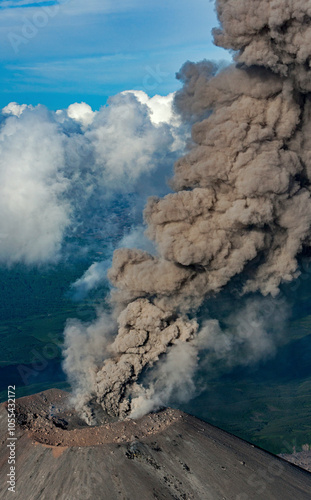 Aerial view of karymsky volcano with smoke and ash cloud, Kamchatka, Russia. photo