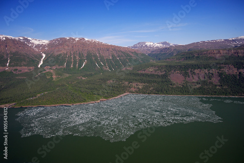 Aerial view of the beautiful Putorana Plateau with majestic mountains, serene lakes, and rugged wilderness, Taymyr Autonomous Okrug, Russia.