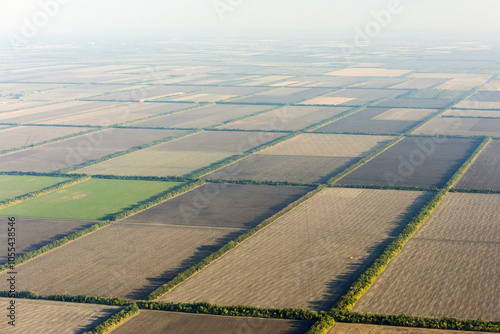 Aerial view of expansive agricultural fields with beautiful patterns and shapes in the countryside, Stavropol Krai, Russia. photo