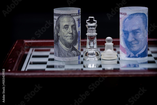 100 dollars and 100 Turkish lira , Economic war on the chessboard. Fictional shooting and custom focus adjustable. photo